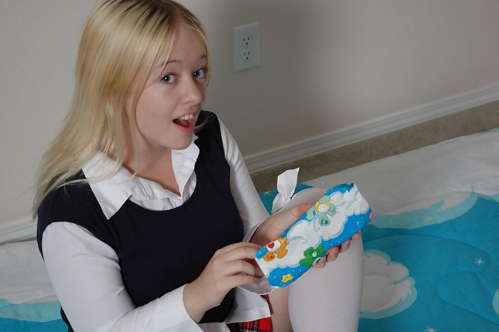 25P Chubby blonde playing with her present: A pink dildo