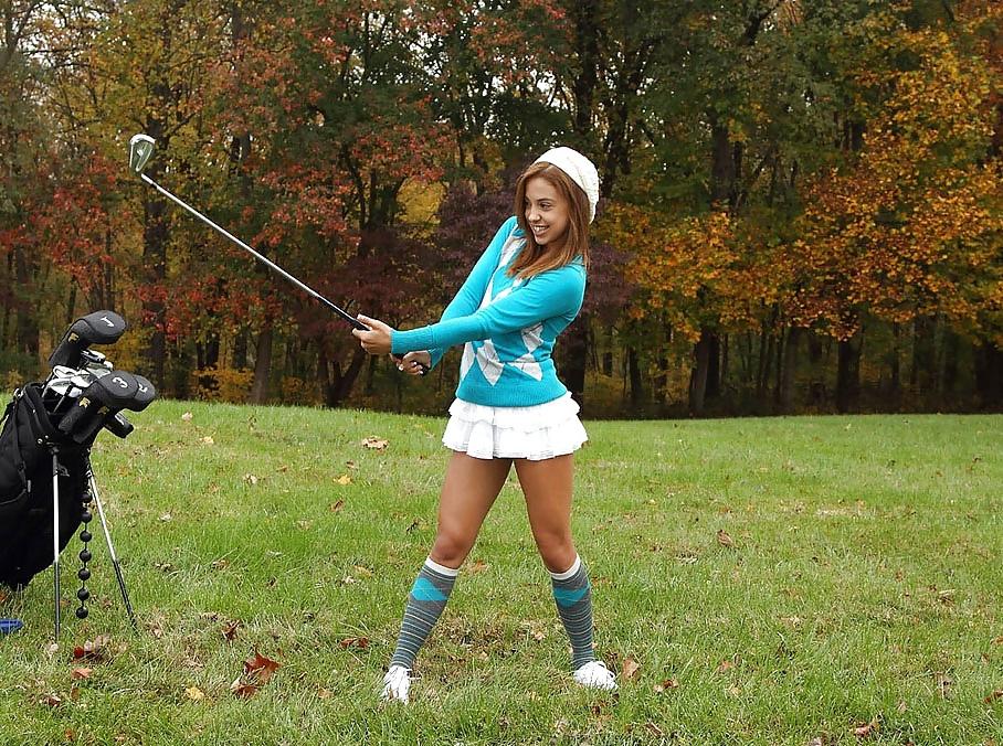 13P Cute teen on public golf course.