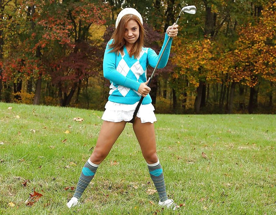 13P Cute teen on public golf course.