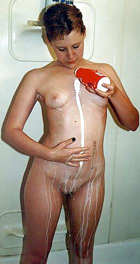 7P Cute redhead teen posing