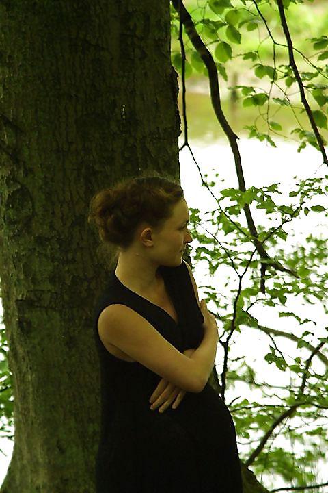 25P Cute pregger taking a walk in the forest
