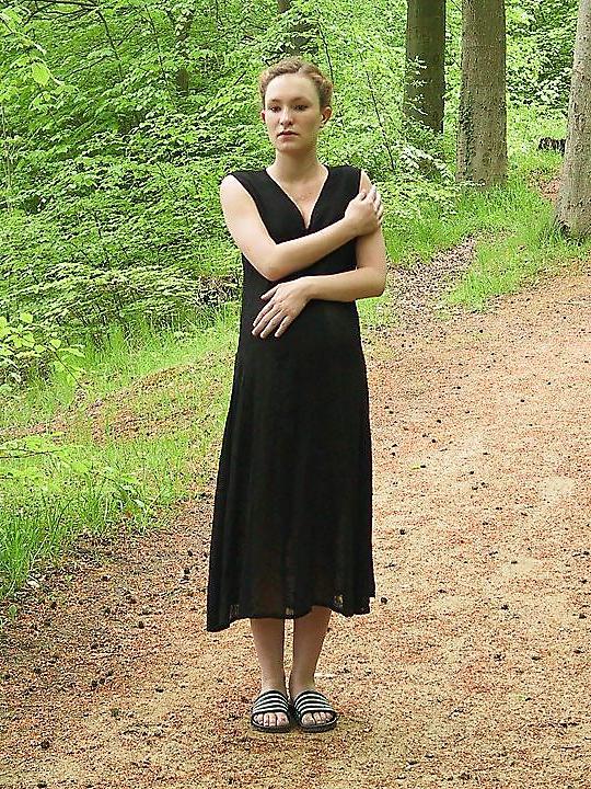 25P Cute pregger taking a walk in the forest