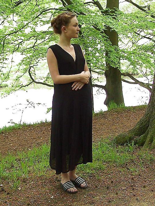 25P Cute pregger taking a walk in the forest