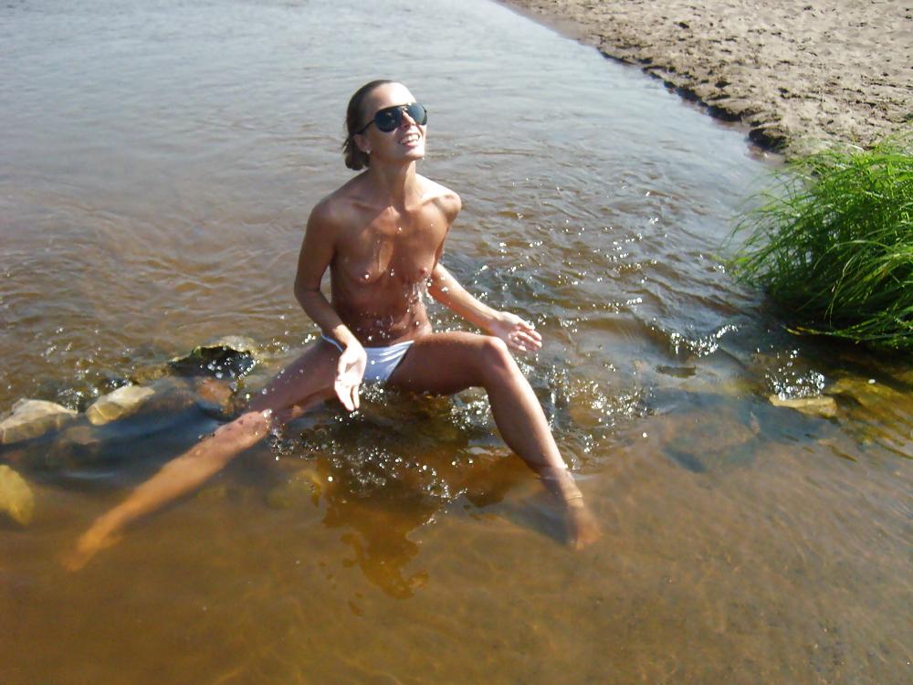 14P Skinny girl topless