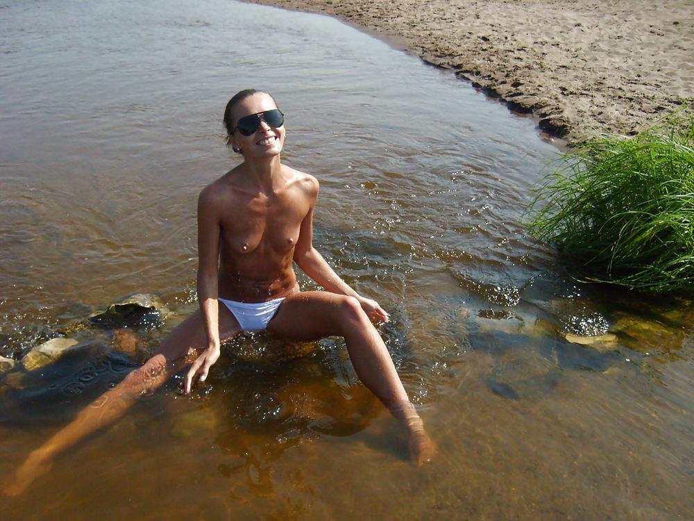 14P Skinny girl topless