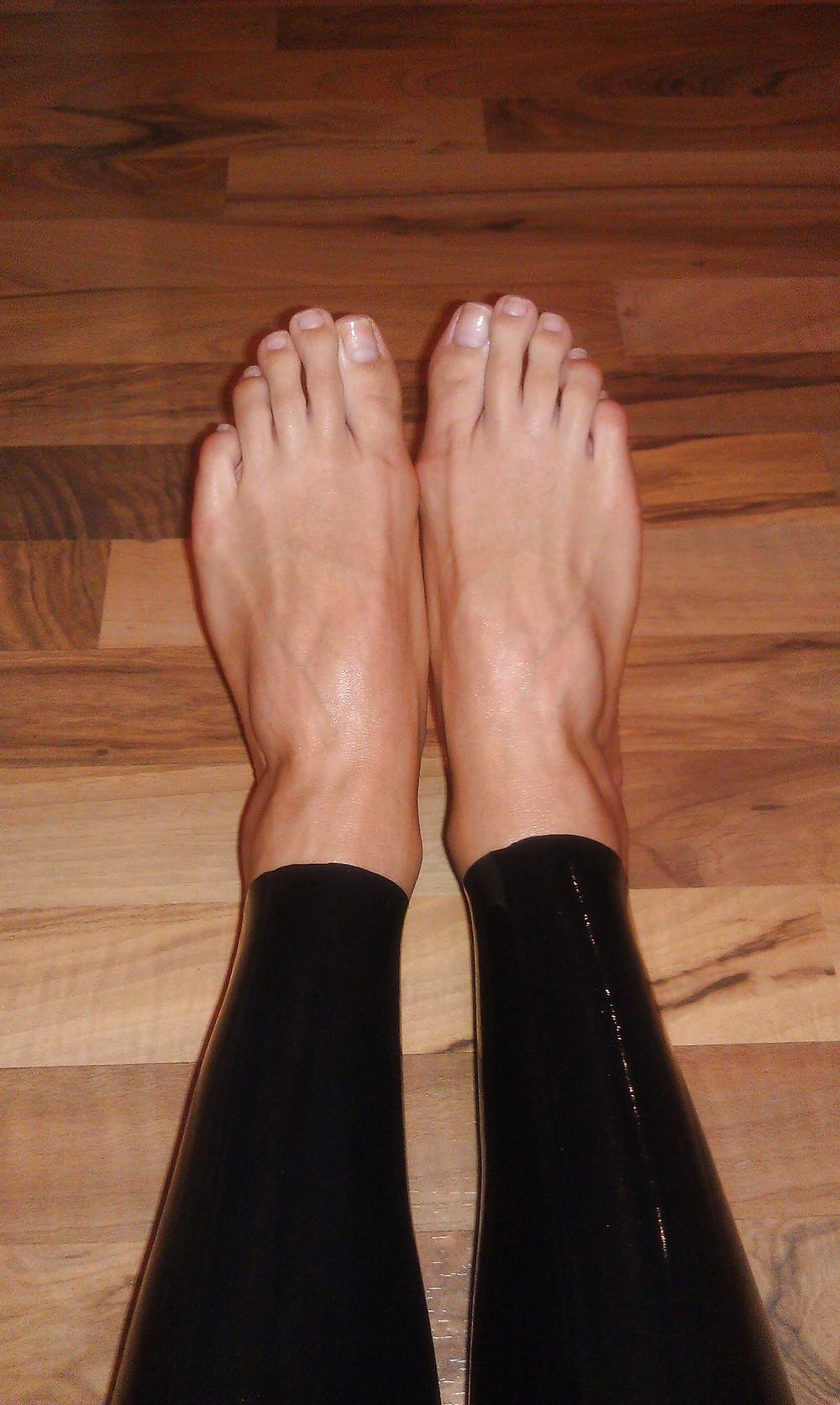 9P Teen Feet in Latex Leggings and standing on Tiptoes
