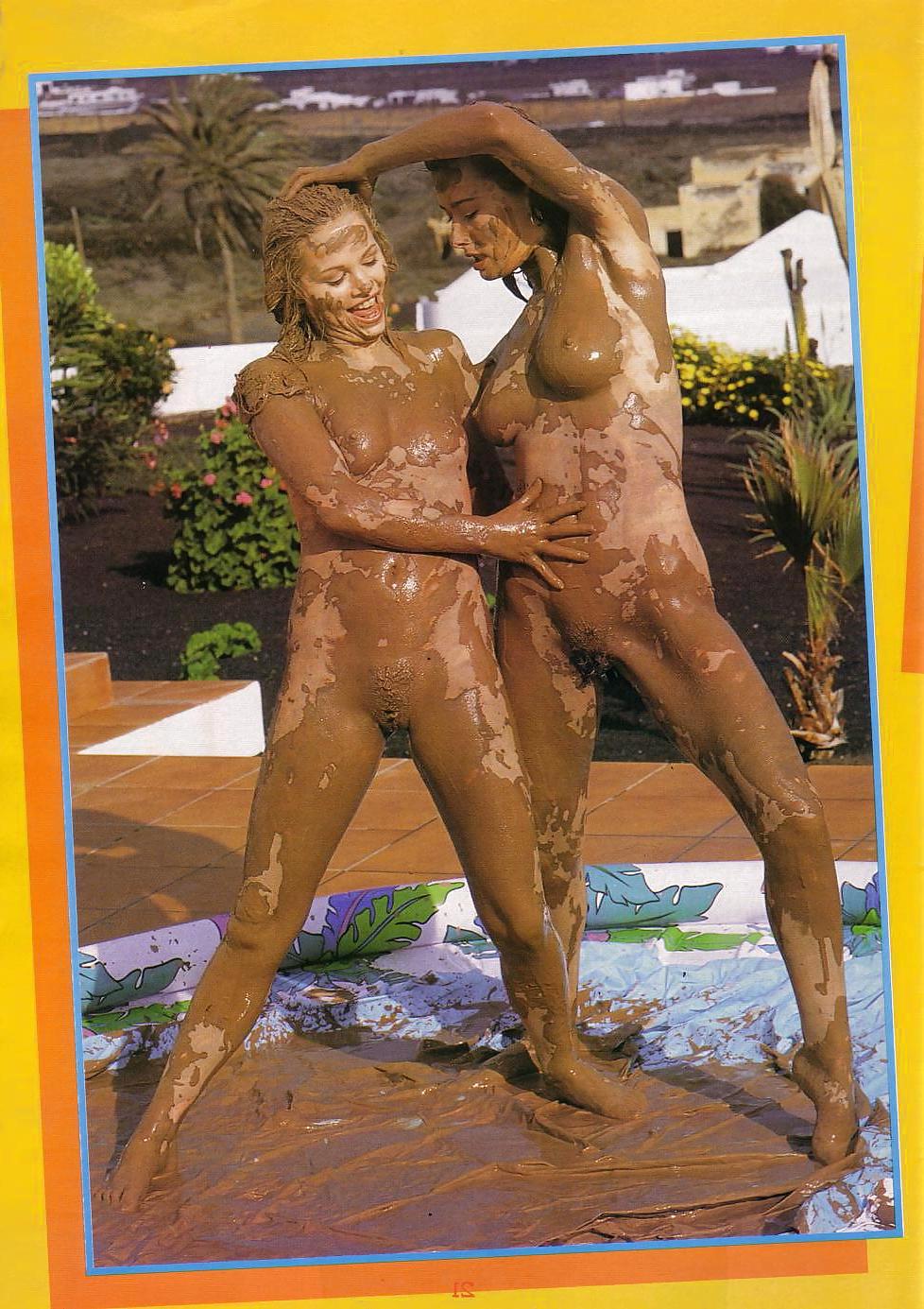 12P Mud fight.  Two babes wrestle.