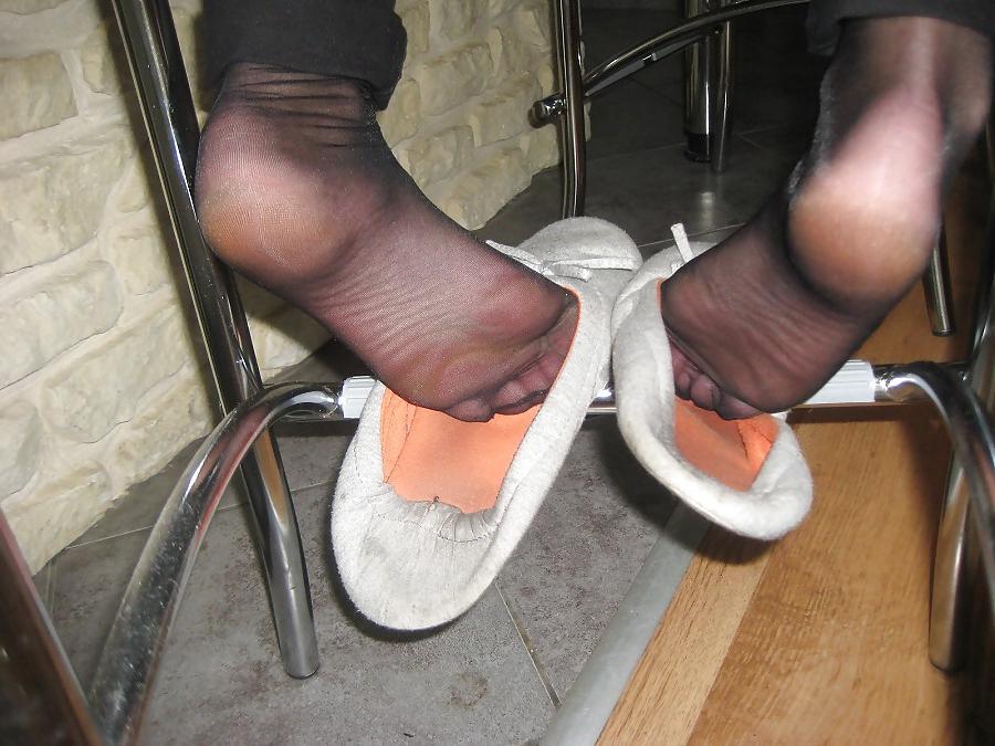 11P Fragrant wife's feet in black tights and slippers