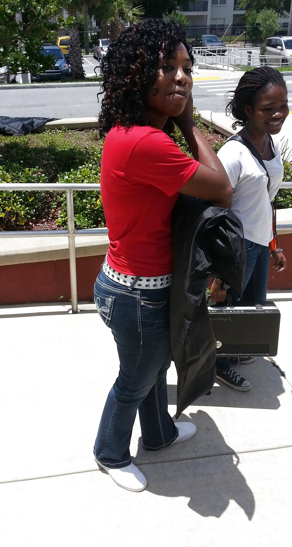 25P Public Voyeurism: Black Bitch Flaunts Assets In Flare Jeans