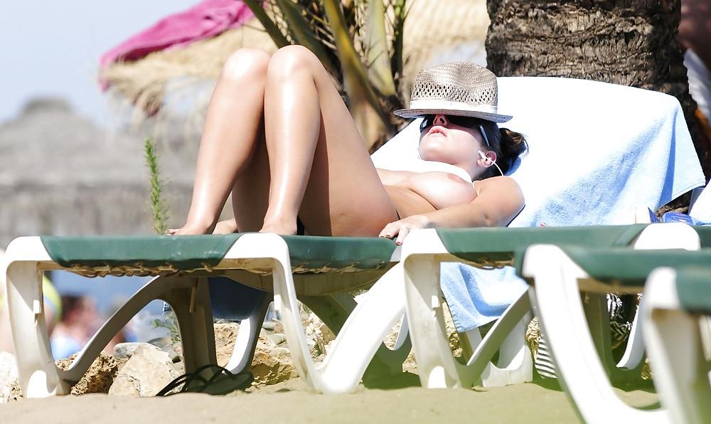 10P Lucy Pinder Topless Candids at the Beach