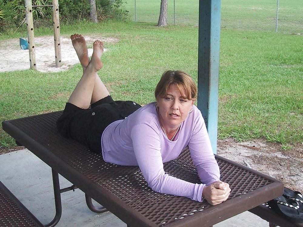 11P Mature TINA shows her hot feet