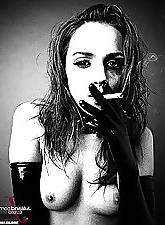 9P Goth Tori Black smoking cigarettes in fetish gear