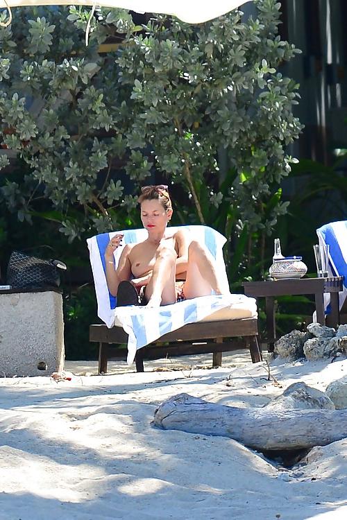 11P Kate Moss Sunbathes Topless on Vacation in Jamaica