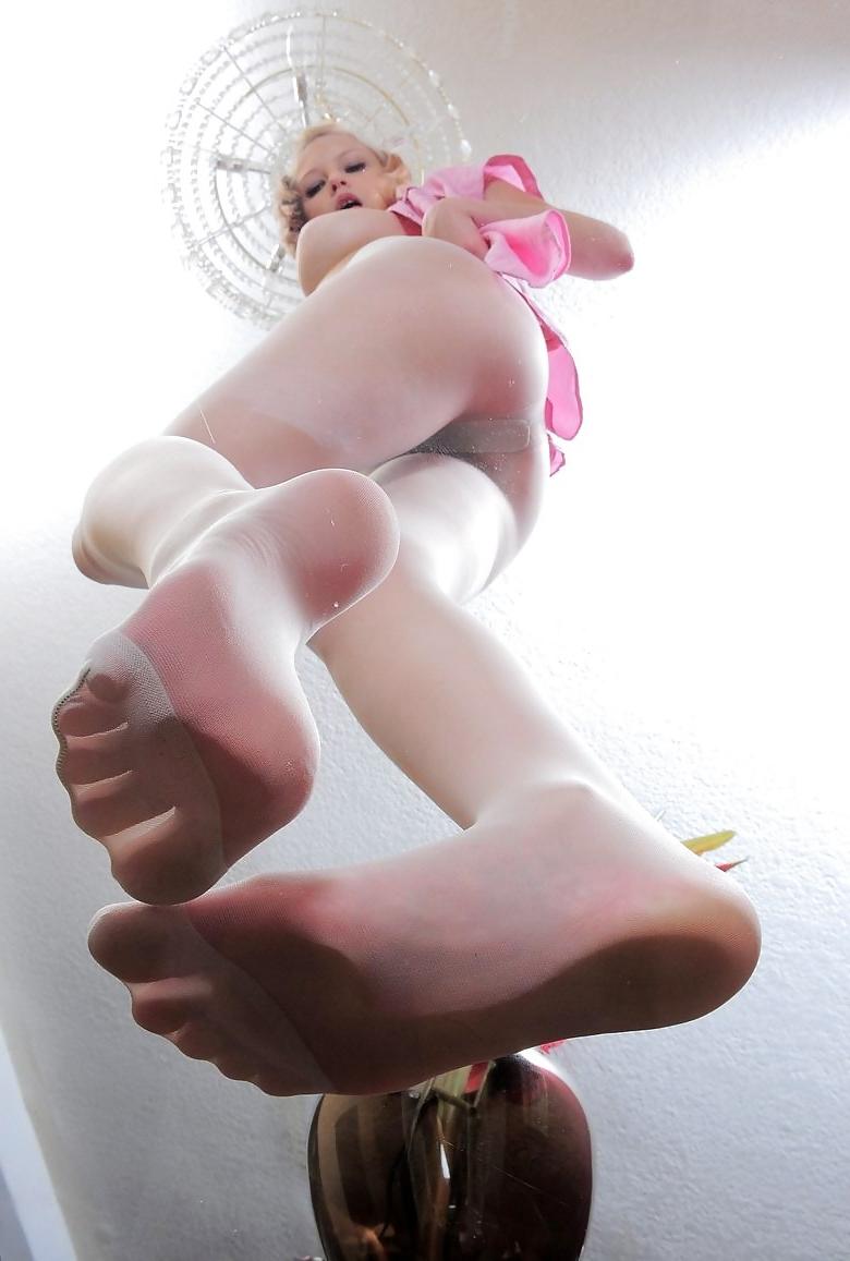 25P Beautiful blonde showing her feet and more