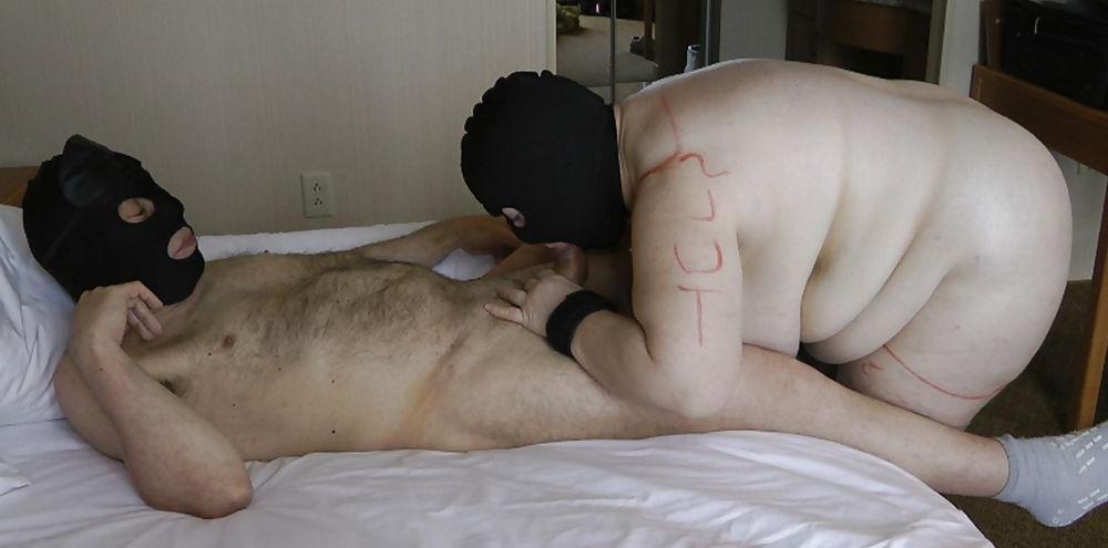 6P Female slave giving male slave a blowjob