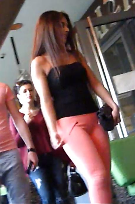 25P Very hot tanned bitch in tight pants touch of cameltoe