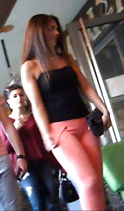25P Very hot tanned bitch in tight pants touch of cameltoe