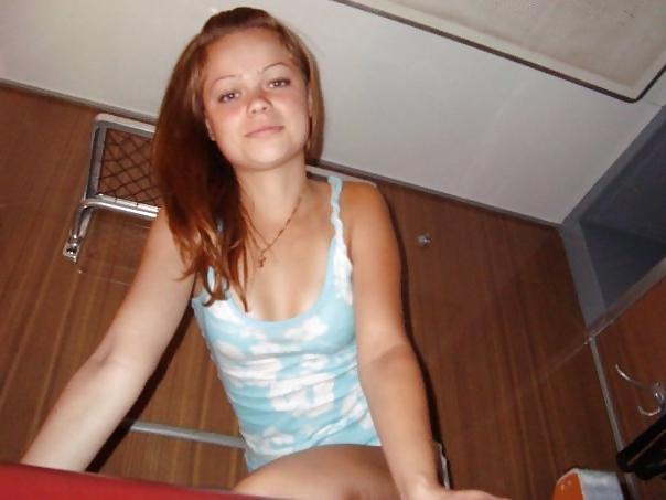 25P Girl in a train compartment