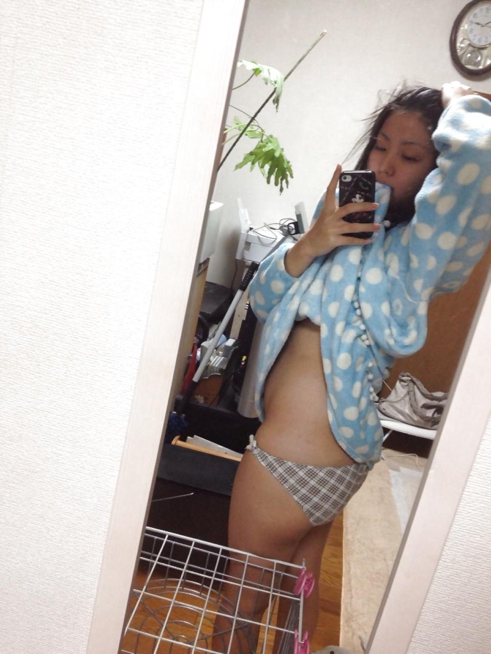21P Super Cute Japanese Schoolgirl's naked selfies
