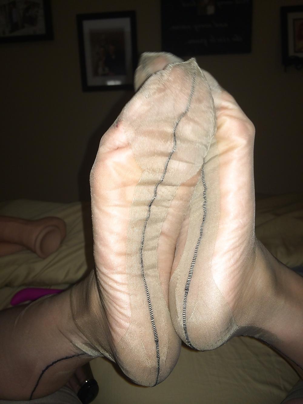25P Her sexy nylon feet