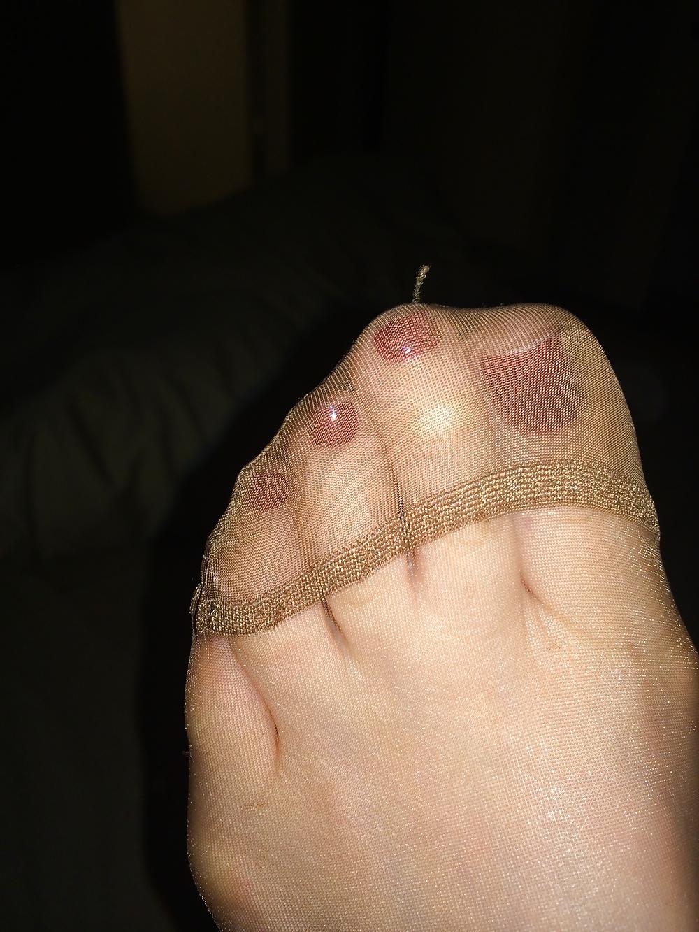 25P Her sexy nylon feet