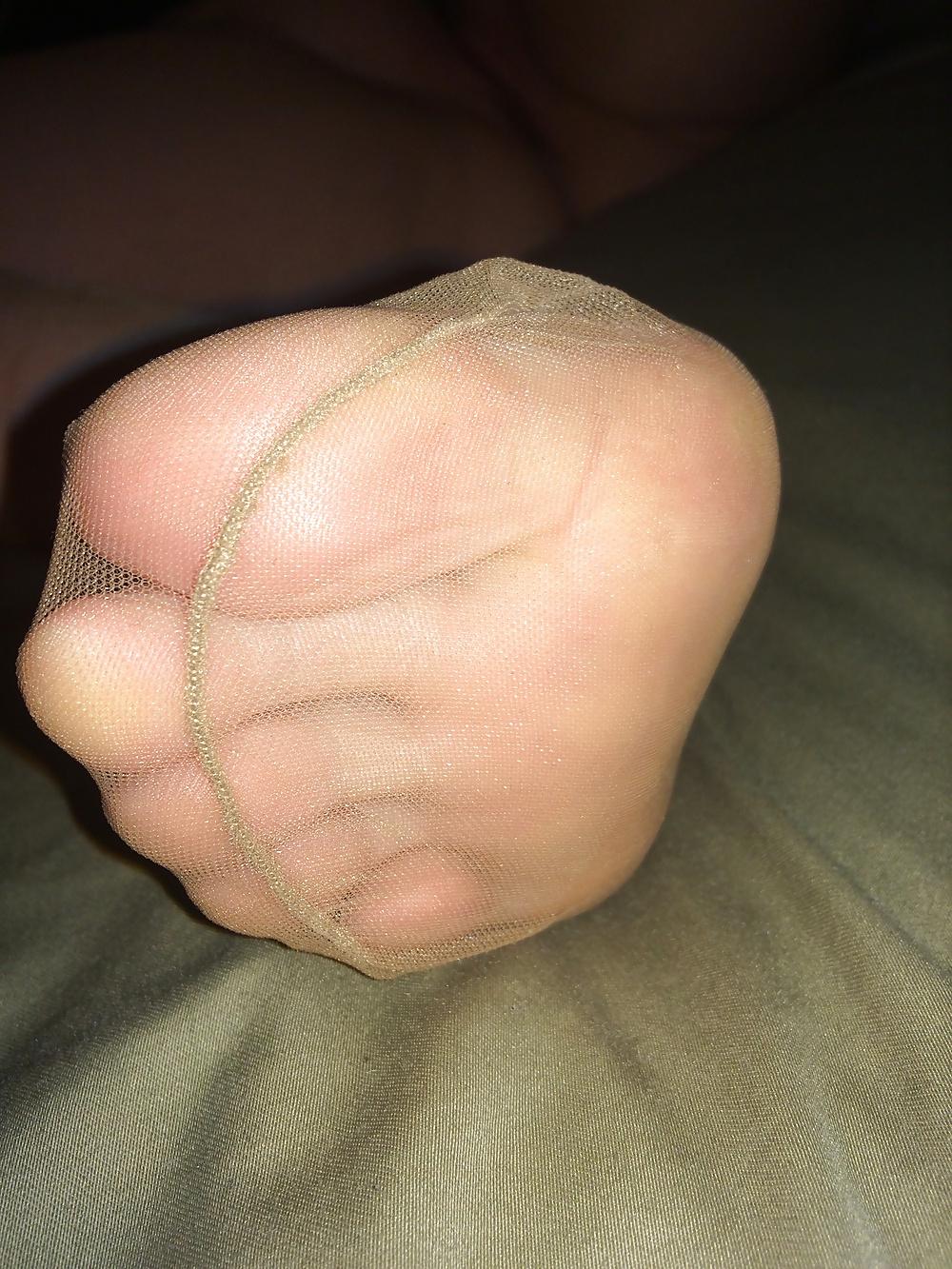 25P Her sexy nylon feet
