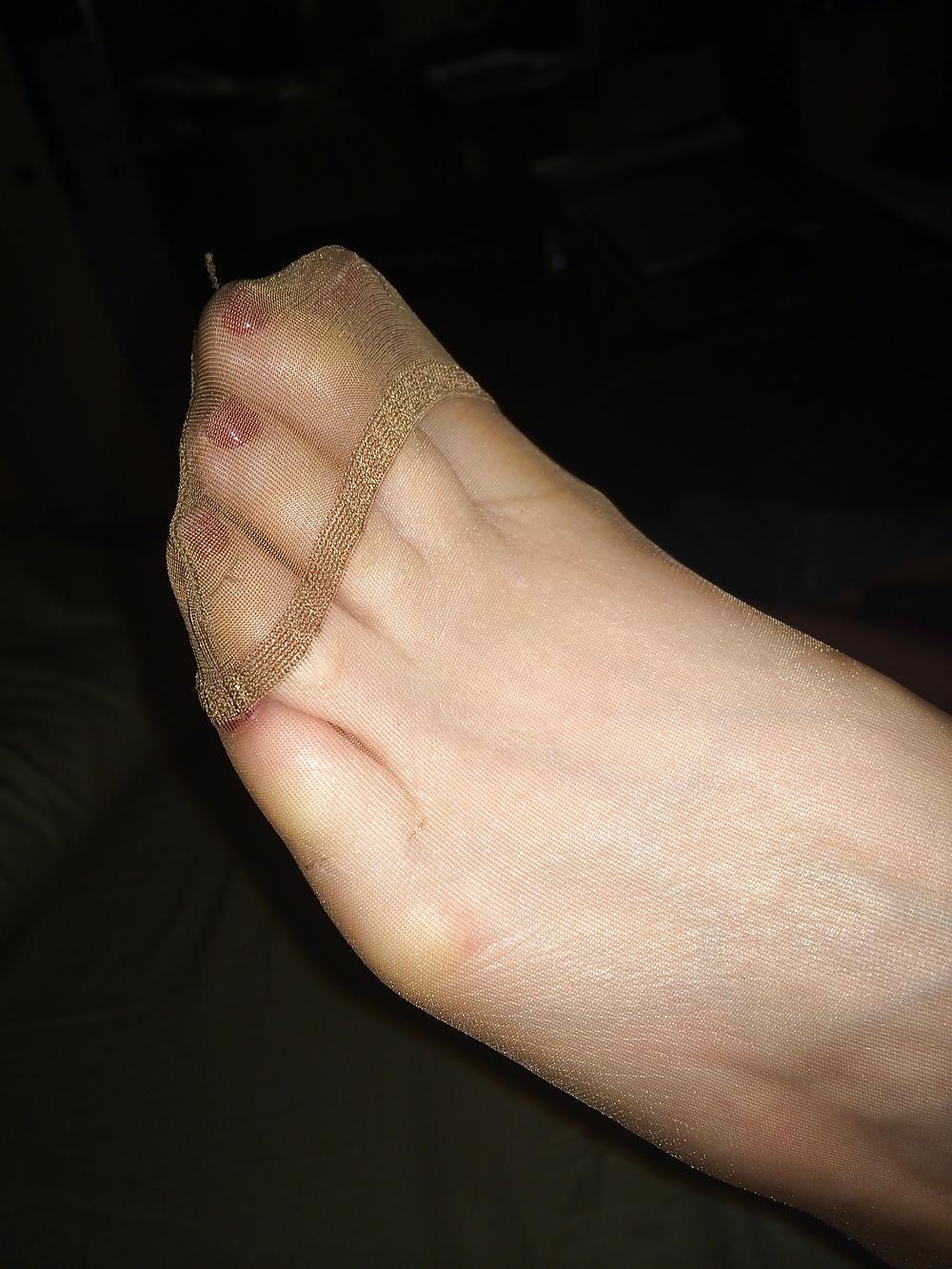 25P Her sexy nylon feet