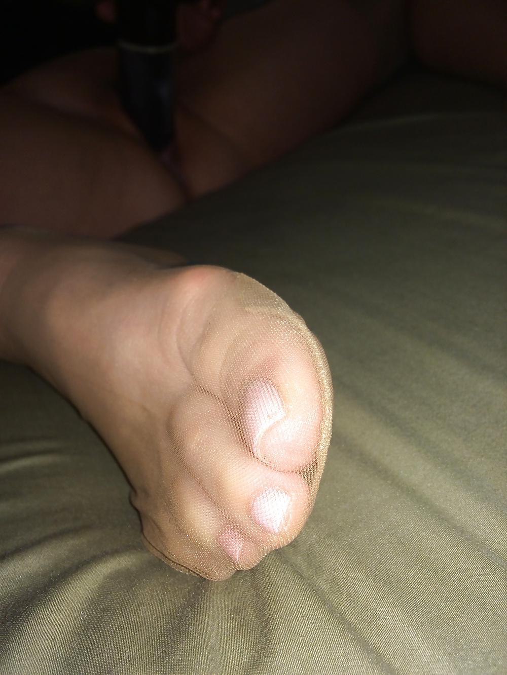 25P Her sexy nylon feet
