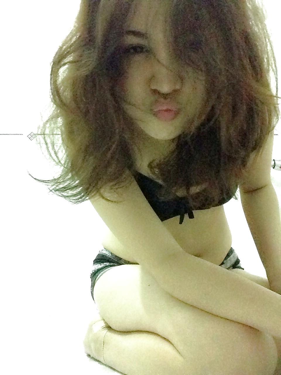 11P Young asian bitch