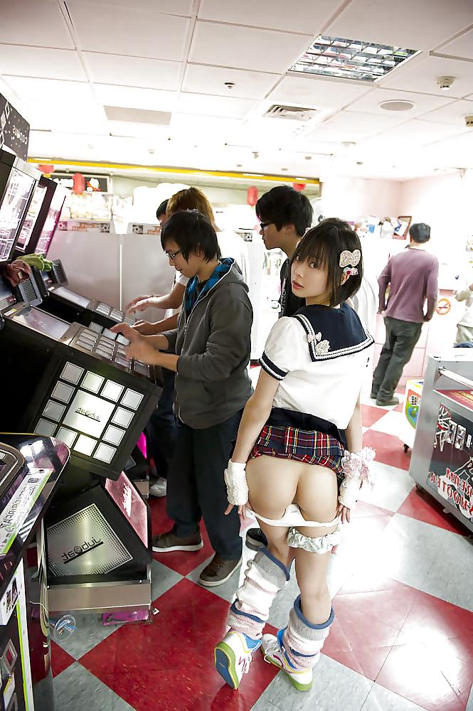 5P Young asian cosplayer teen in public