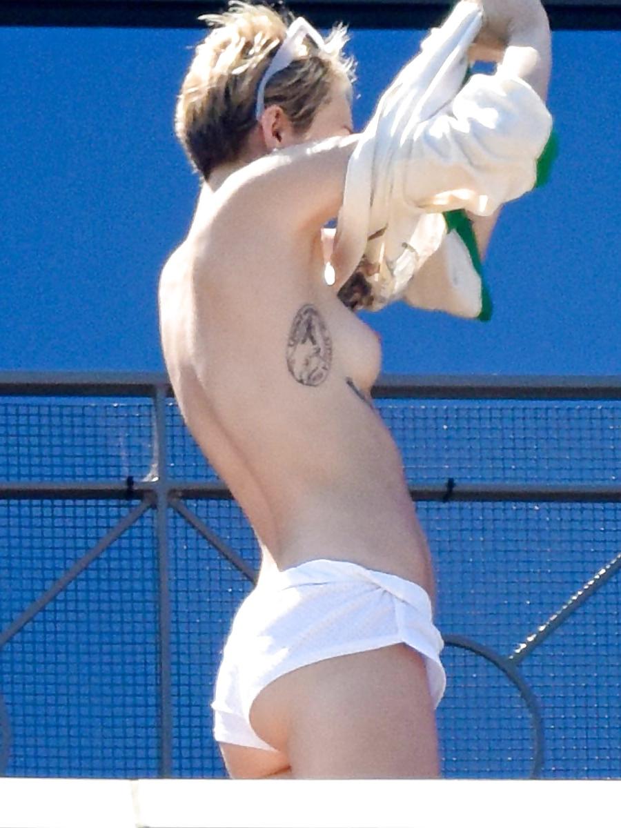 14P Miley Cyrus topless in Australia