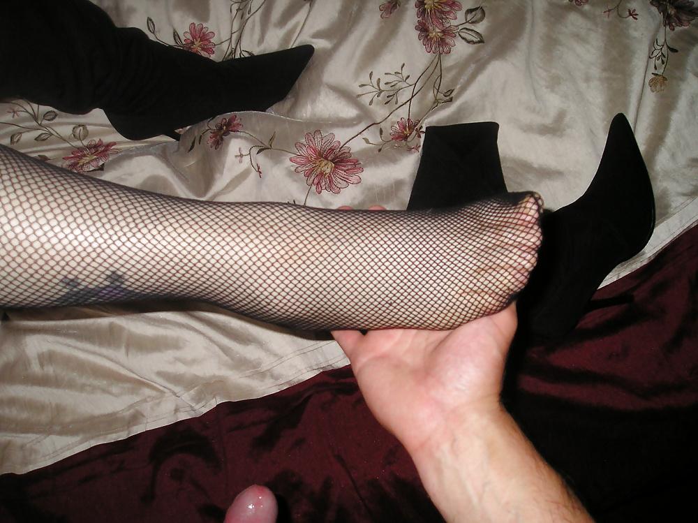 25P Natasha's arse and feet wearing fishnet stockings
