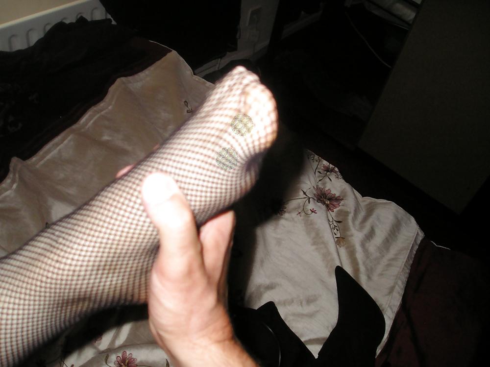 25P Natasha's arse and feet wearing fishnet stockings