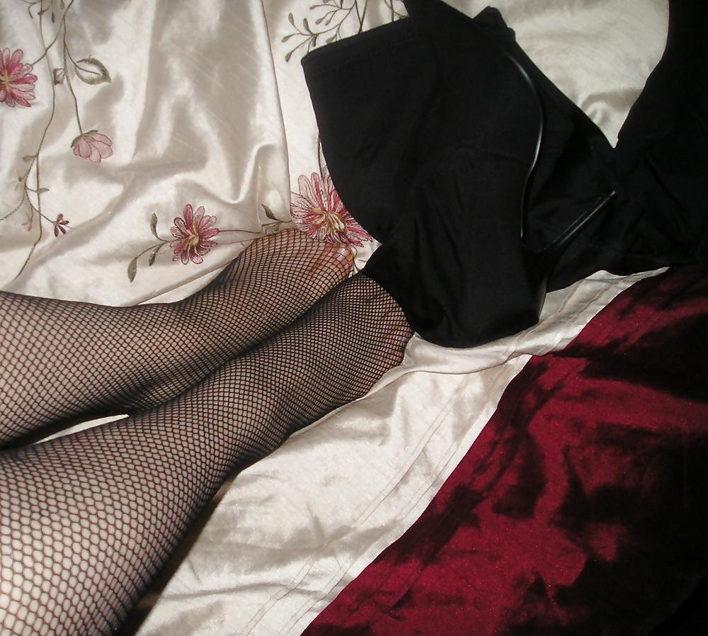 25P Natasha's arse and feet wearing fishnet stockings