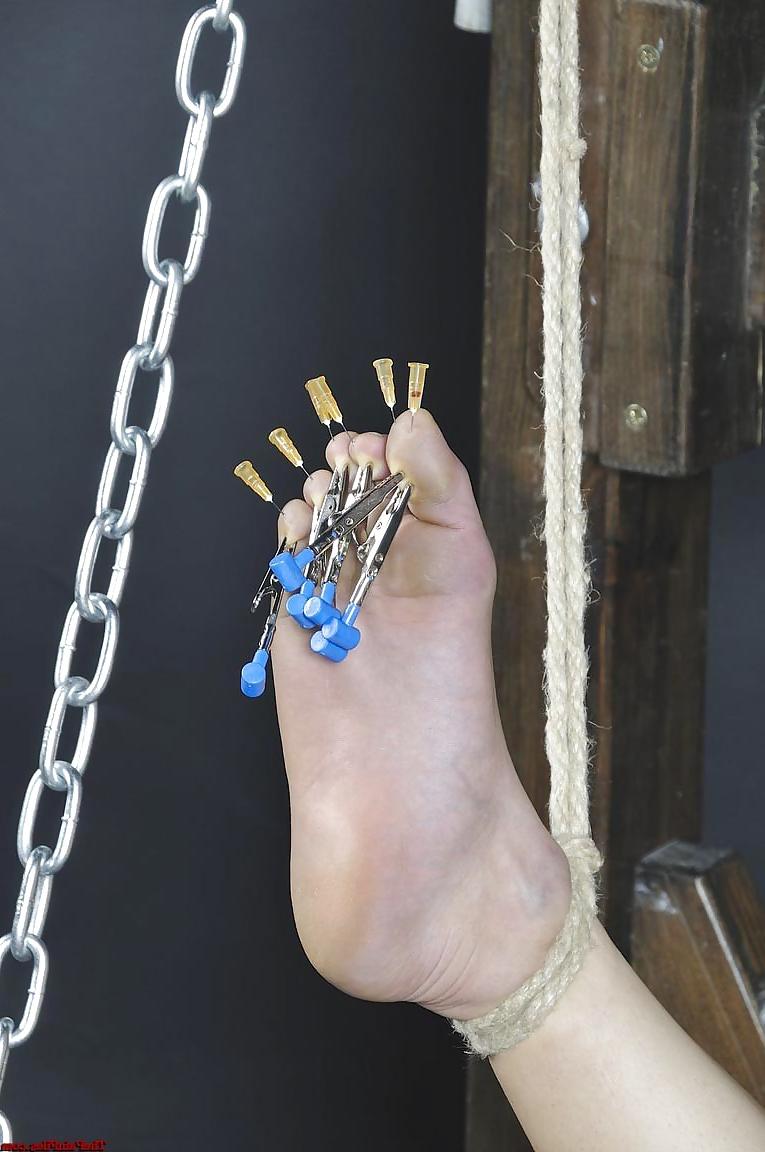 25P Feet tied and torture