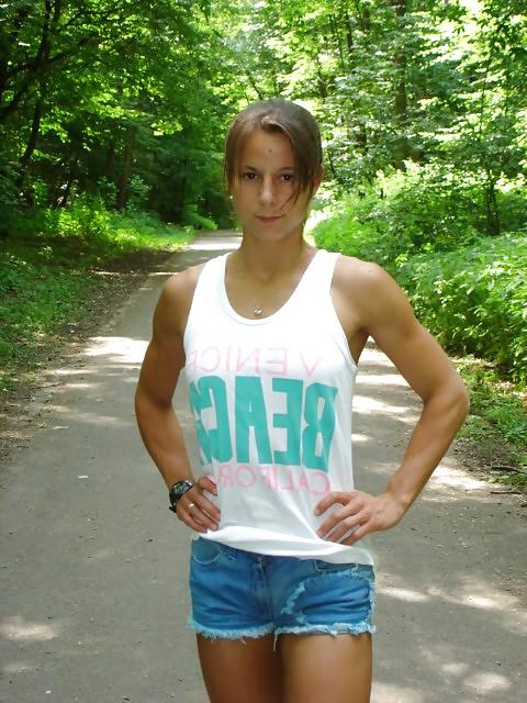 25P Young girl with muscles