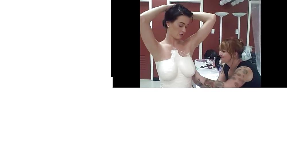 19P Katy Perry topless plastering. 