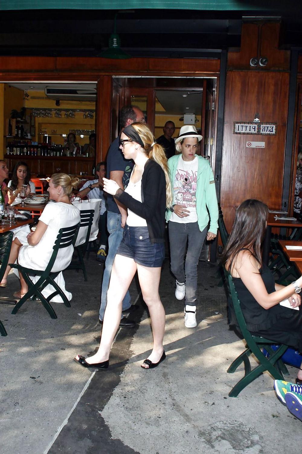 25P Lindsay Lohan is leggy smoking a cigarette in denim shorts
