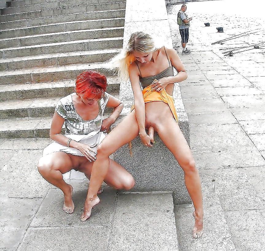 22P Two girls have sex in public.