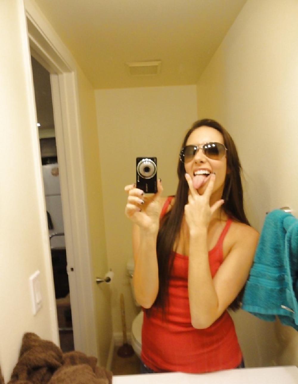 14P Young bitch posing in the mirror