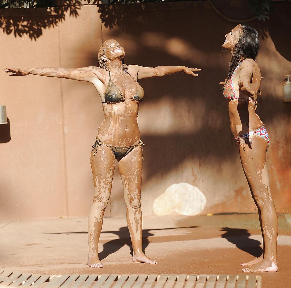 25P Imogen Thomas in a bikini having some fun in the pool mud