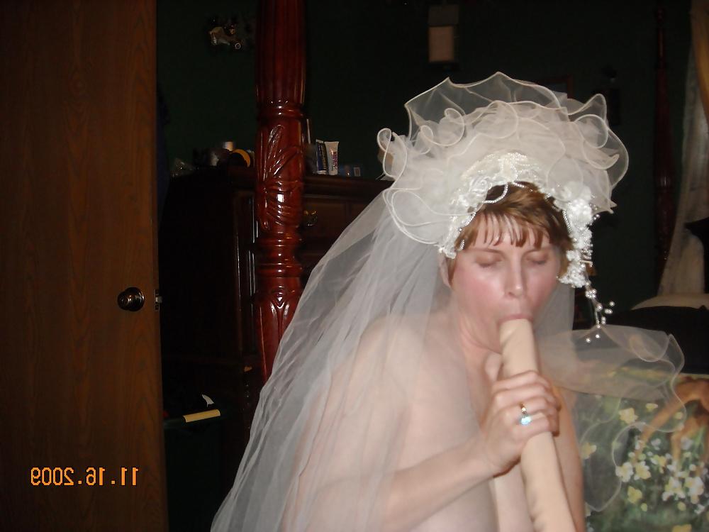 20P Busty MILF bride fucks a double ender
