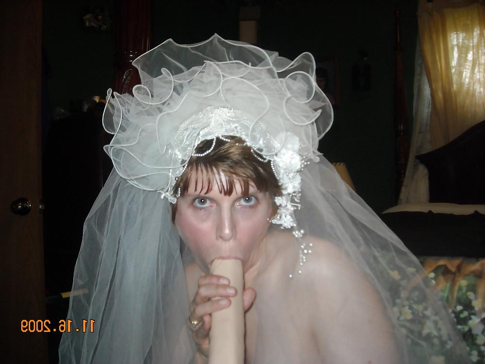 20P Busty MILF bride fucks a double ender