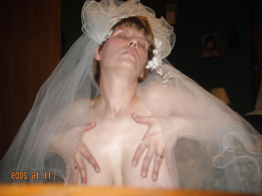 20P Busty MILF bride fucks a double ender