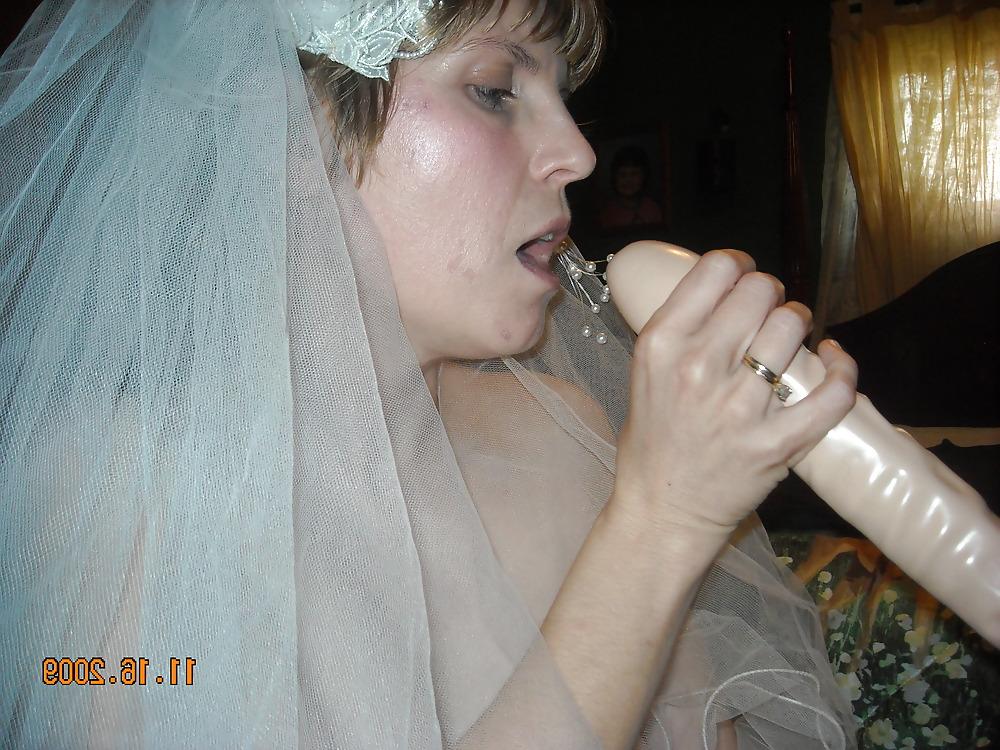20P Busty MILF bride fucks a double ender