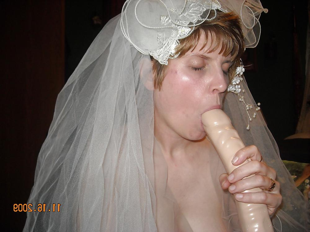 20P Busty MILF bride fucks a double ender