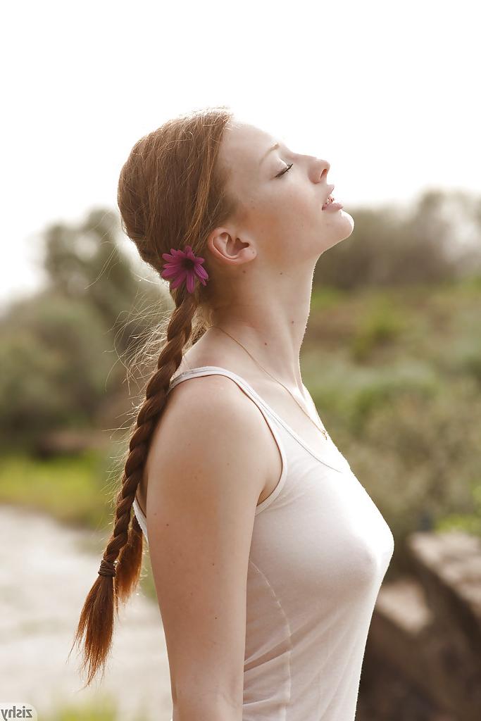 12P Pigtail wearing redhead teen Wendy Patton having fun exposing herself