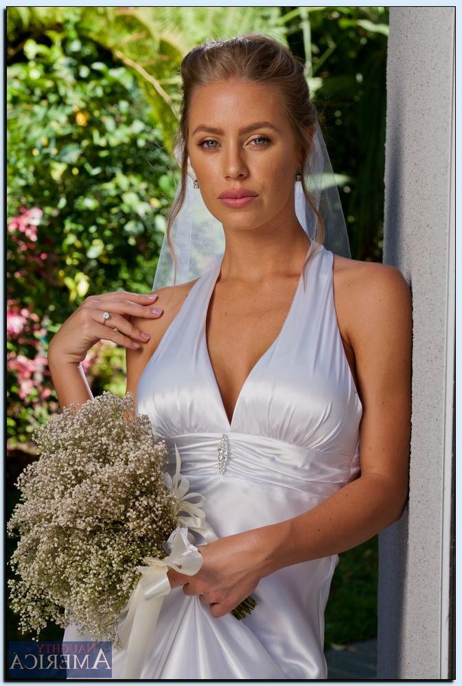 16P Stupendous bride in stockings gets rid of her dress and lingerie
