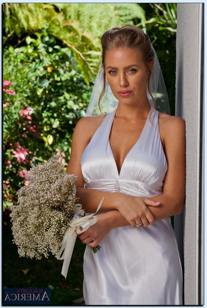 16P Stupendous bride in stockings gets rid of her dress and lingerie