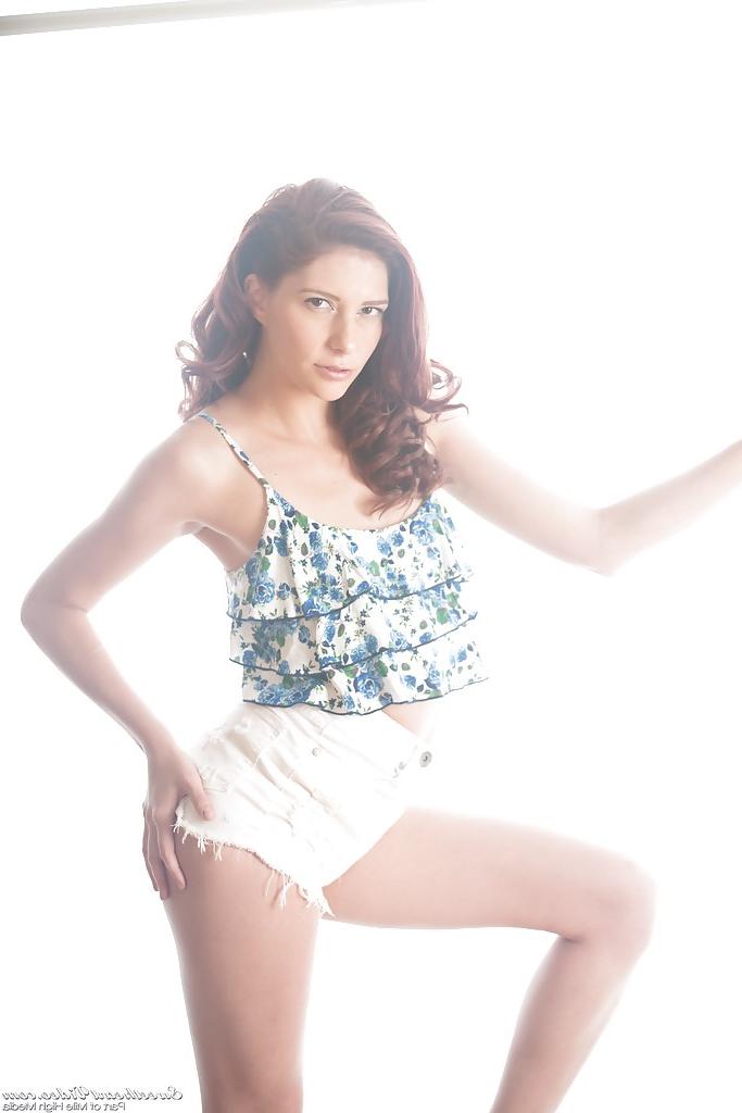 16P Redhead beauty Ashlyn Molly pulls down panties to reveal hairy muff